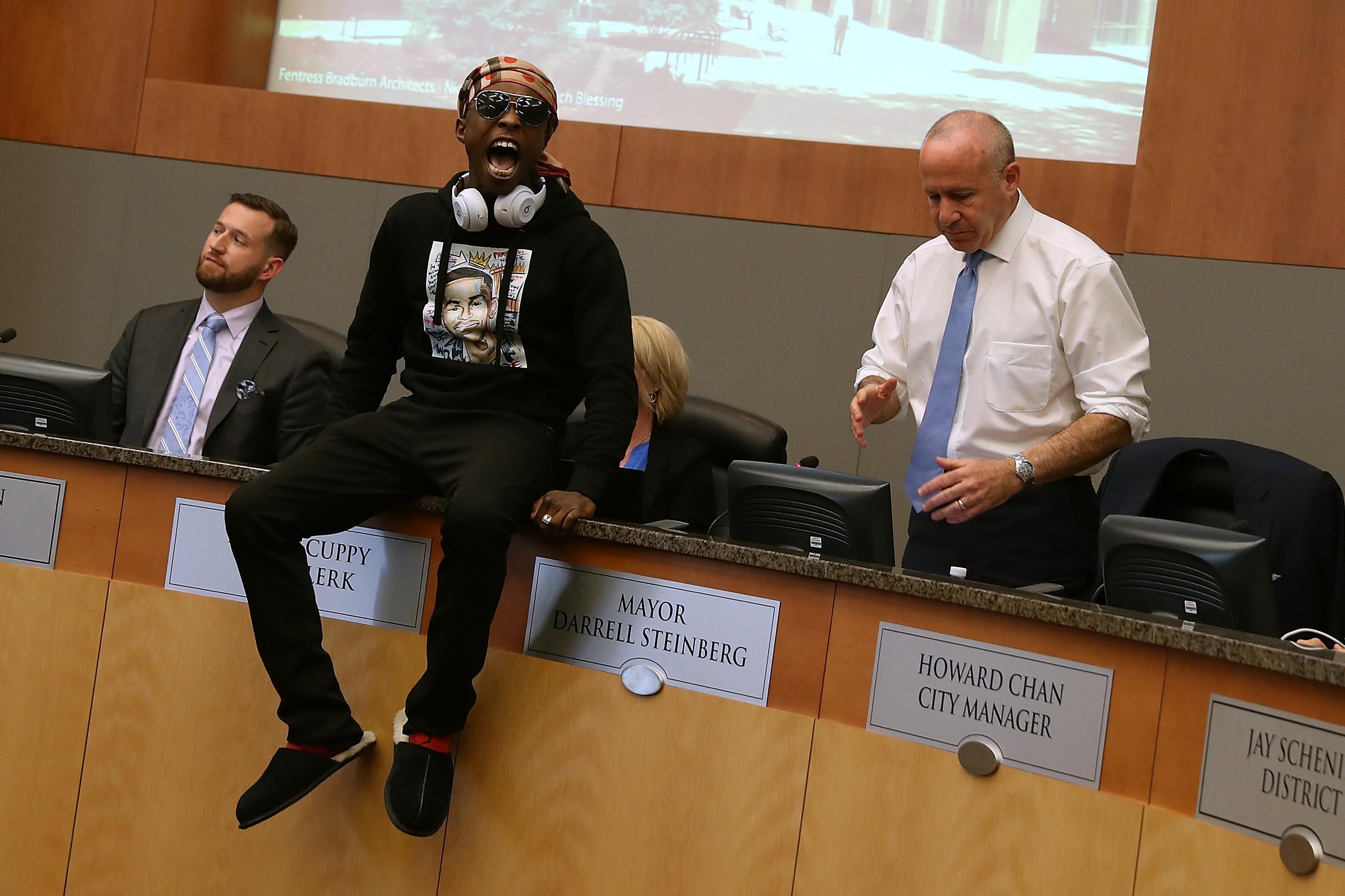 Stevante Clark, brother of Stephon Clark, disrupts the special city council meeting in Sacramento City Hall.