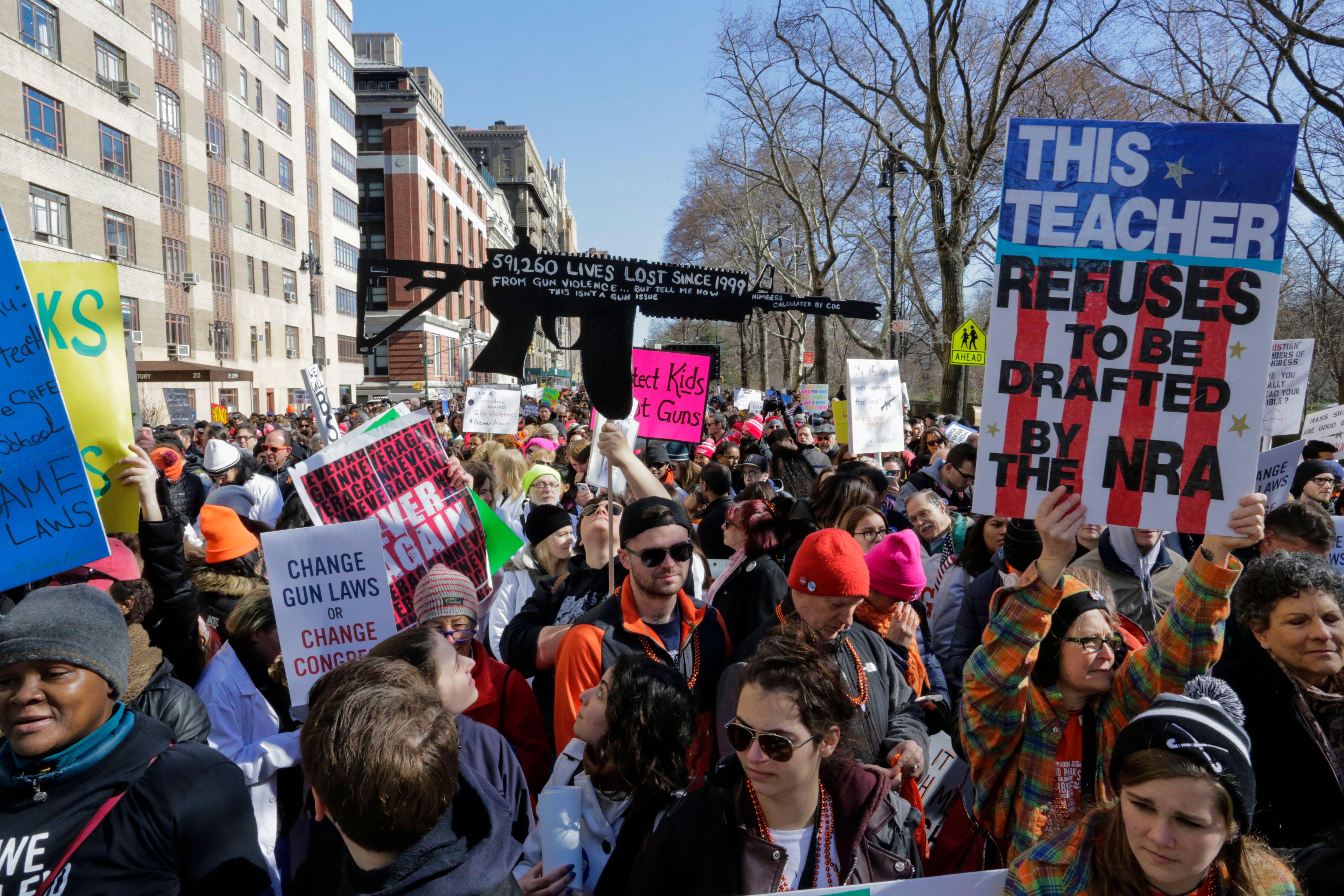 People take part in the March for Our Lives Rally near Central Park West in New York on March 24, 2018.
