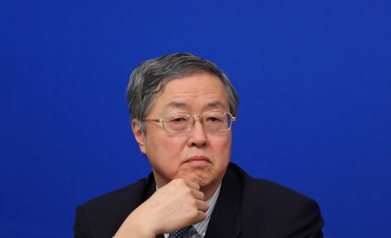 Zhou Xiaochuan, governor of the People's Bank of China, speaks during a press conference held for the National People's Congress at the media center on March 13, 2013, in Beijing.