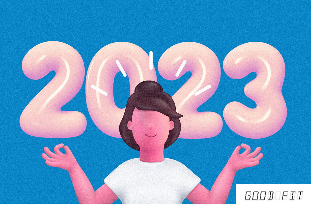 A woman with a bun meditates in front of a 2023 balloon. A "Good Fit" watermark appears in the lower right-hand corner.
