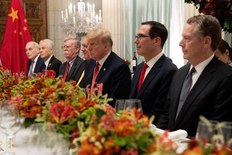 US President Donald Trump (C), US Secretary of the Treasury Steven Mnuchin (2-R), US Trade Representative Robert Lighthizer along with members of their delegation hold a dinner meeting with China's President Xi Jinping (out of frame) at the end of the G20 Leaders' Summit in Buenos Aires, on December 01, 2018. - US President Donald Trump and his Chinese counterpart Xi Jinping had the future of their trade dispute -- and broader rivalry between the world's two top economies -- on the menu at a high-stakes dinner Saturday. (Photo by SAUL LOEB / AFP)        (Photo credit should read SAUL LOEB/AFP/Getty Images)