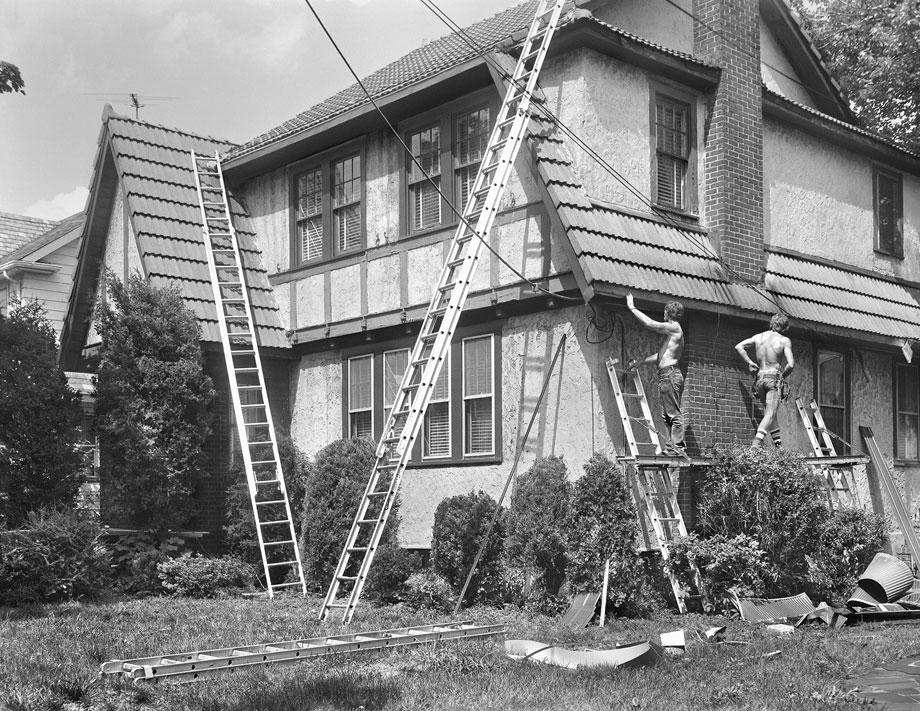 Two Men Repairing West Brighton House