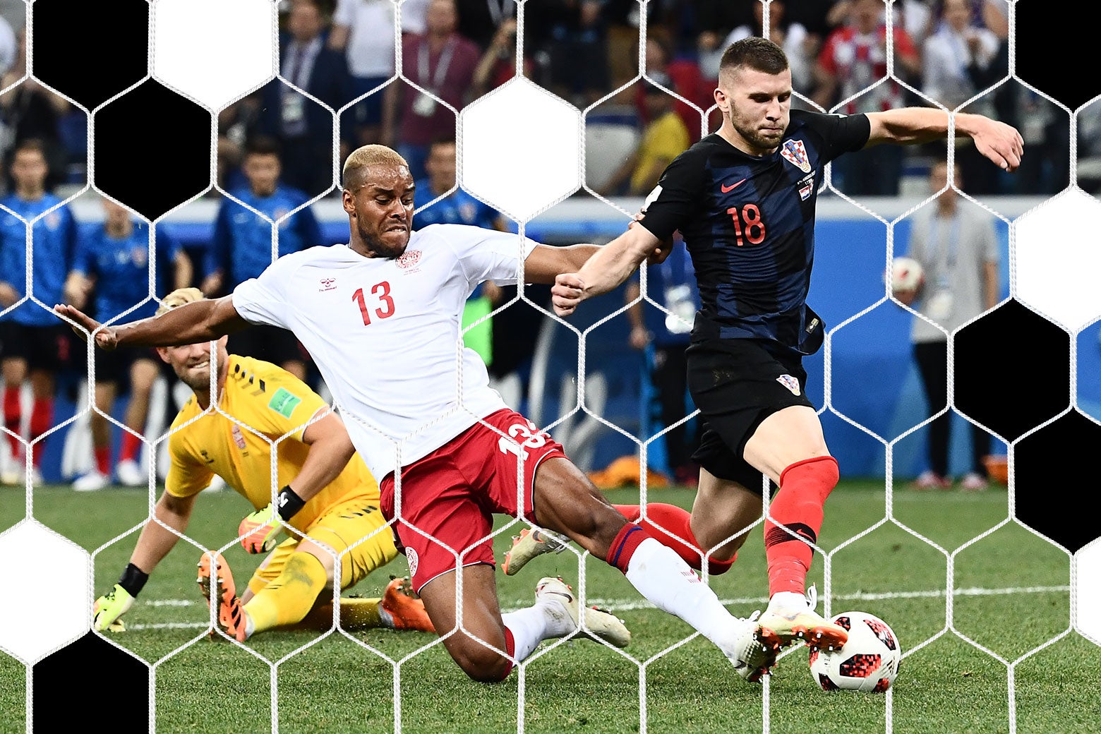 Denmark’s defender Mathias Jørgensen fouls Croatia’s forward Ante Rebić.