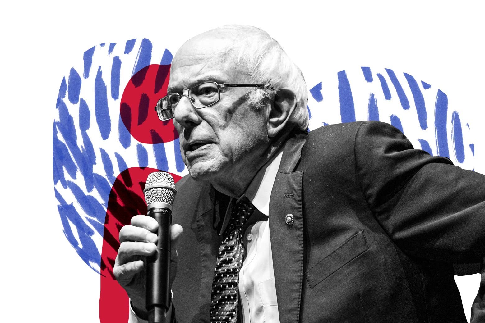 Bernie Sanders holds a microphone.