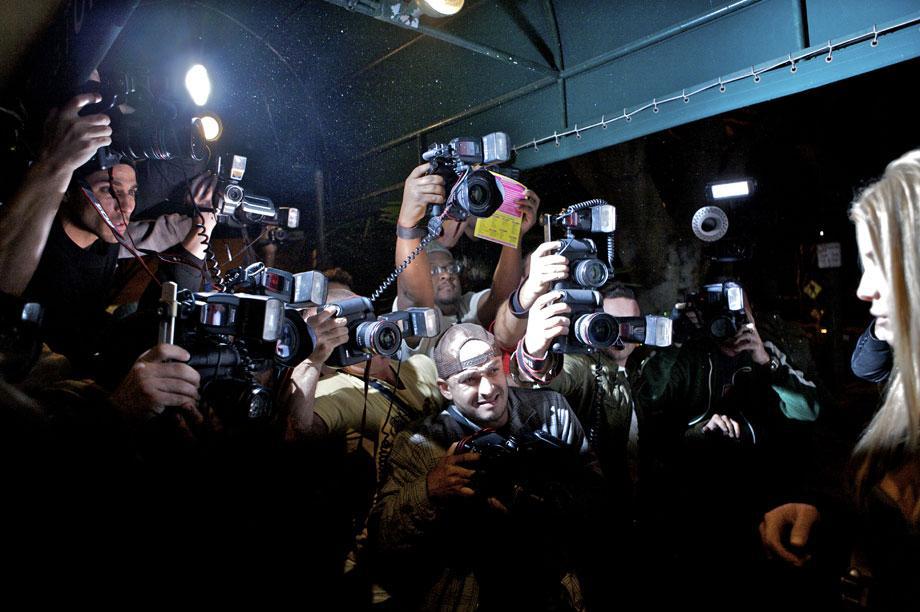 Paparazzi clamor for a shot of Jessica Simpson as she comes out of the restaurant Madeo in Los Angeles, Nov. 1, 2008.