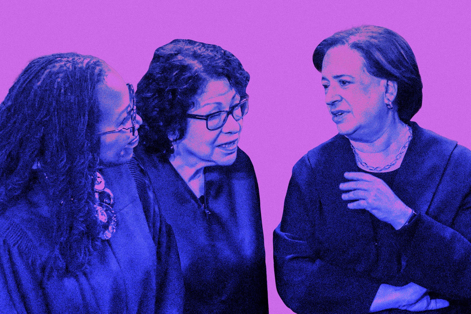 Justices Ketanji Brown Jackson, Sonia Sotomayor, and Elena Kagan in their robes looking like they're talking.
