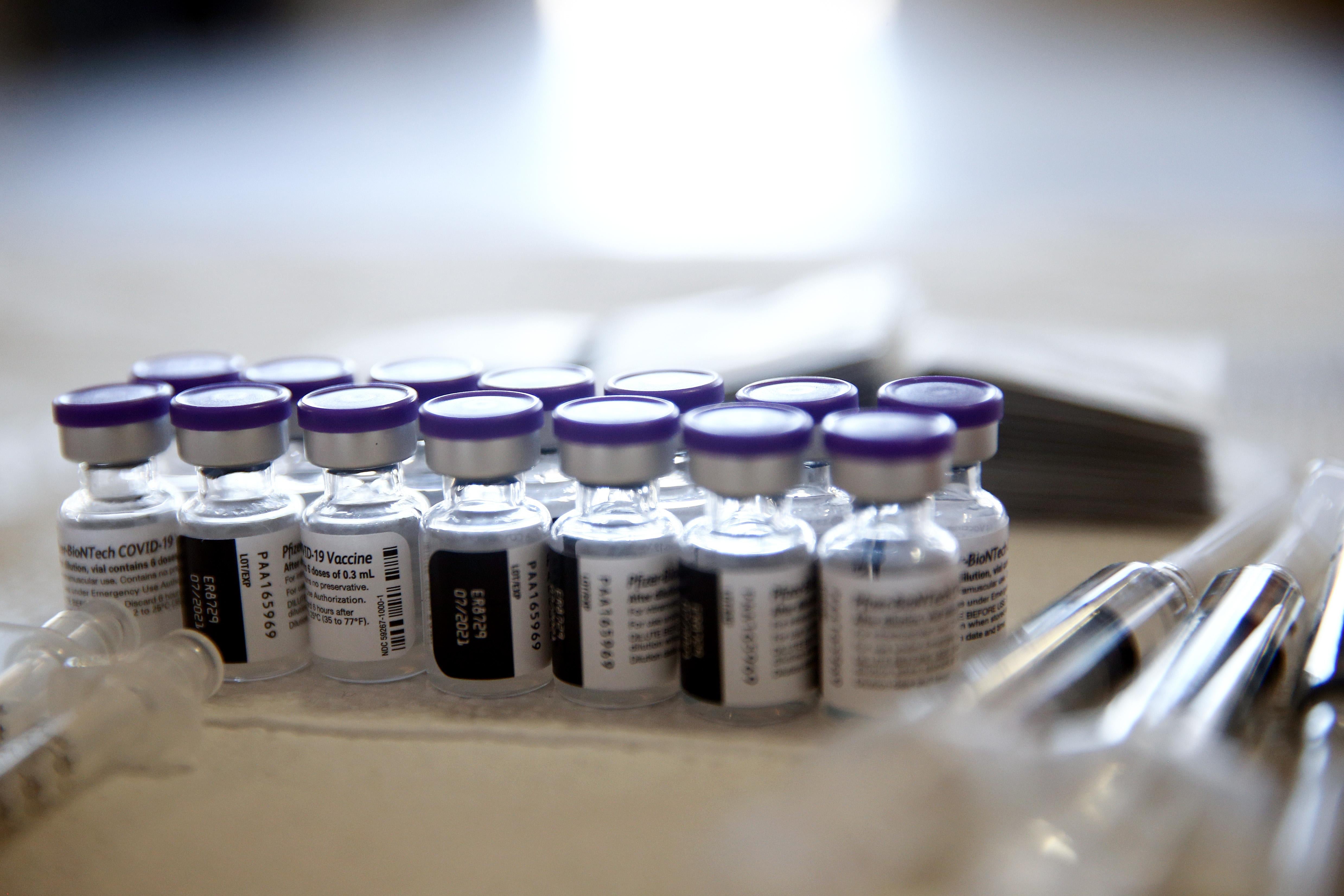Vials containing doses of the Pfizer COVID-19 vaccine are viewed at a clinic targeting minority community members at St. Patrick's Catholic Church on April 9, 2021 in Los Angeles, California. 