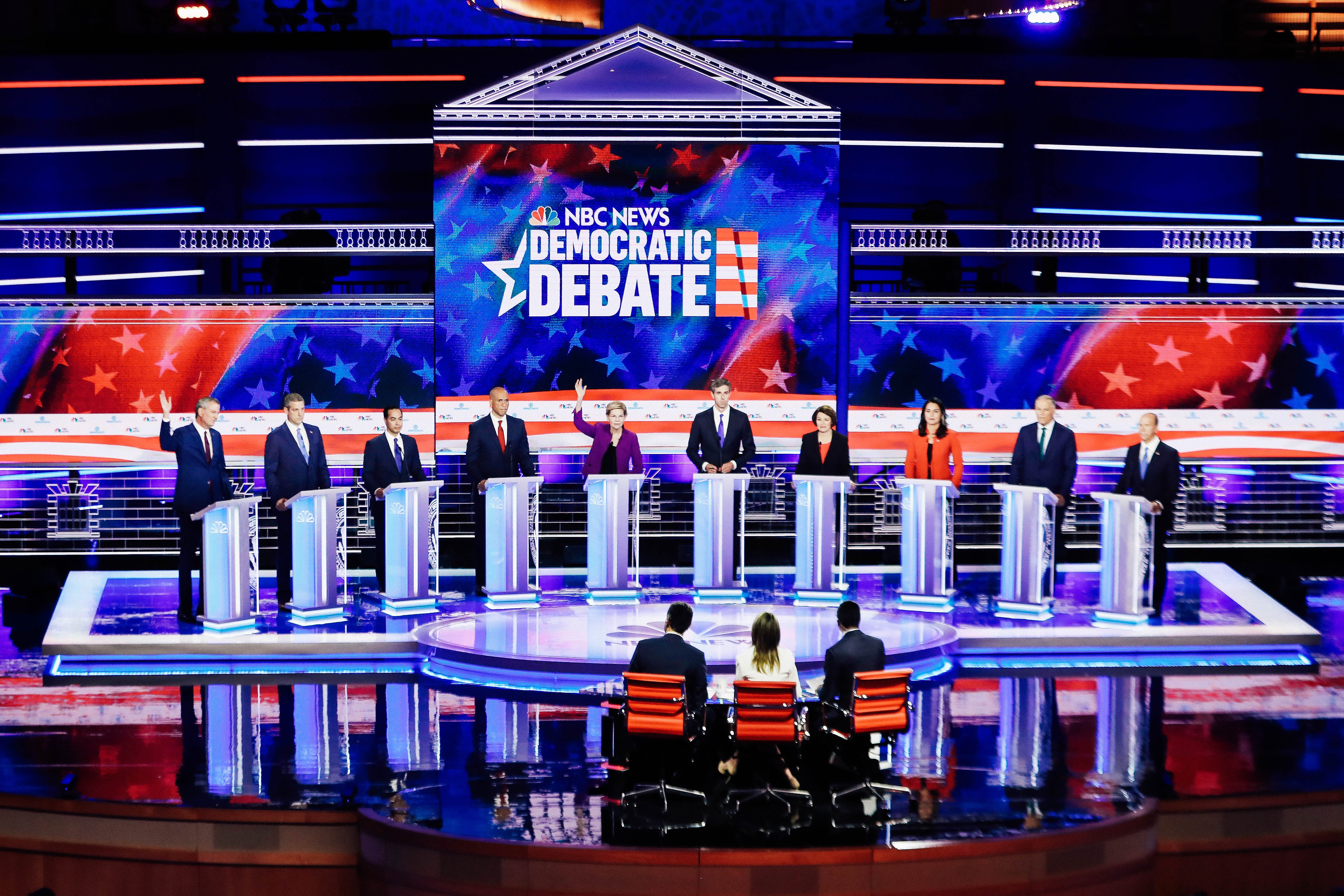 Candidates respond to a question from the moderators on Night 1 of the 2020 Democratic Primary debates in Miami on Wednesday.