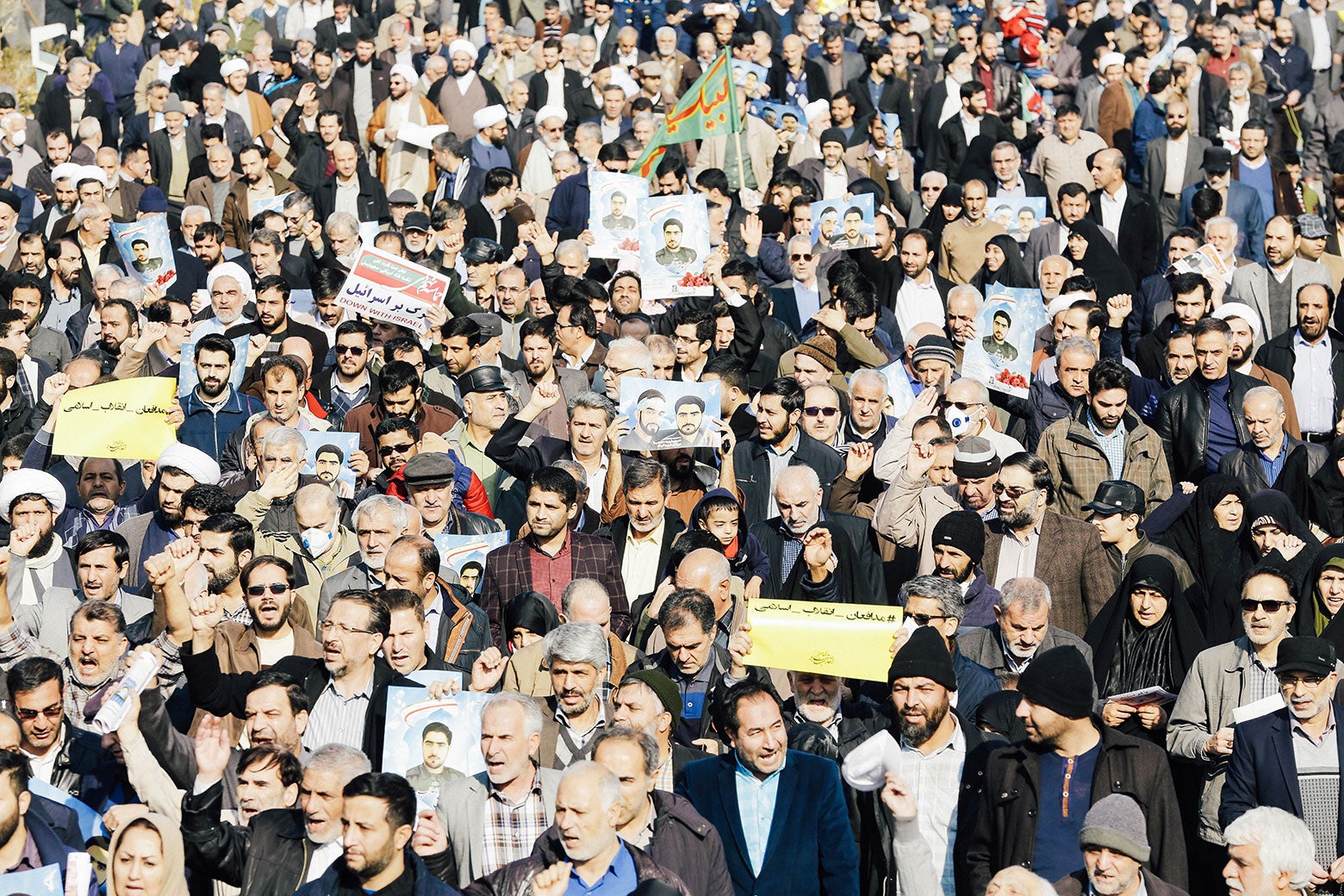 Iranian pro-government protesters take part in a march held after the weekly Friday prayers in central Tehran on Jan. 5.