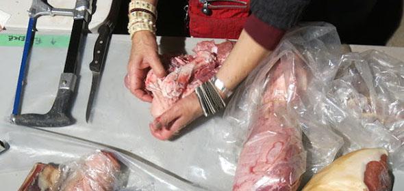 Reshaping a pork hock into a man's forearm for a Hannibal scene.