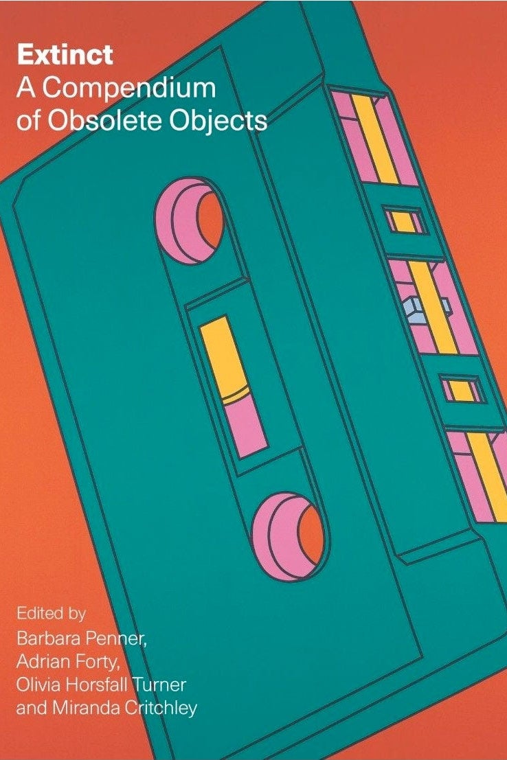 An orange-and-teal book cover with title reading Extinct: A Compendium of Obsolete Objects, featuring a cassette tape.