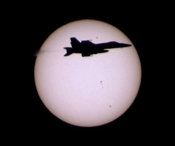 f18 in front of the Sun