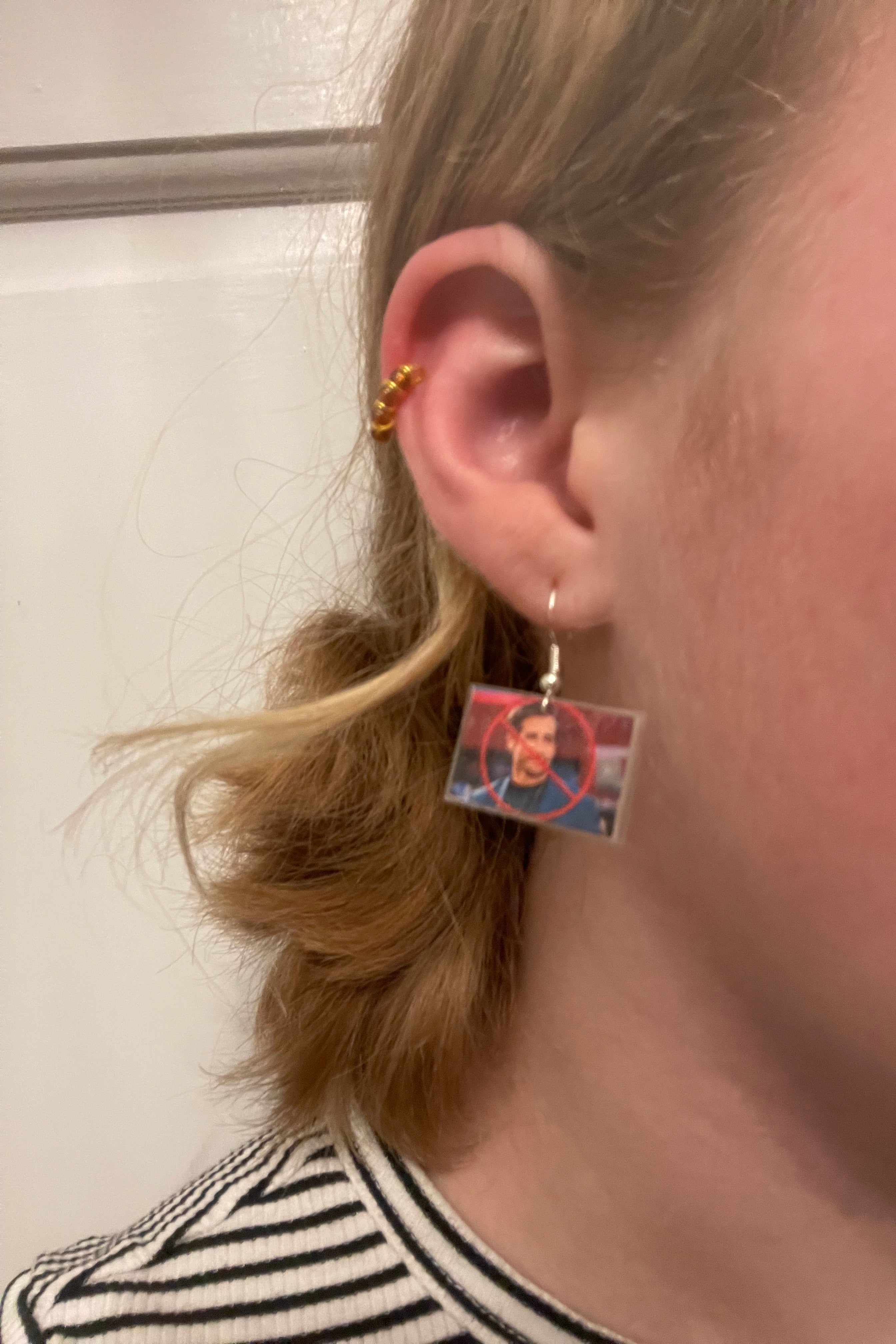 Caroline wearing the earrings.