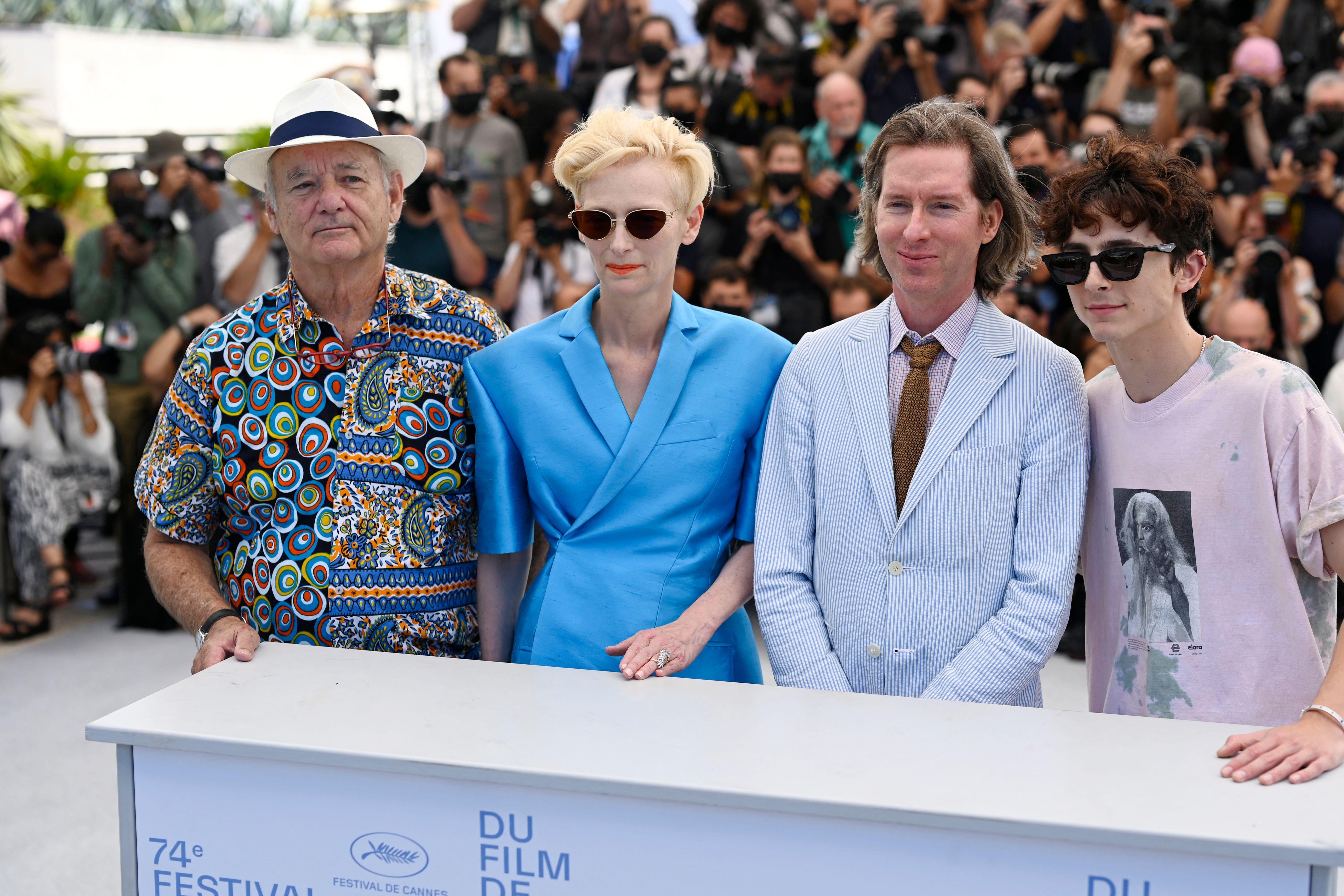 U.S. actor Bill Murray, British actress Tilda Swinton, U.S. director Wes Anderson and French-U.S. actor Timothee Chalamet pose during a photo call for the film "The French Dispatch" at the 74th edition of the Cannes Film Festival in Cannes, southern France.