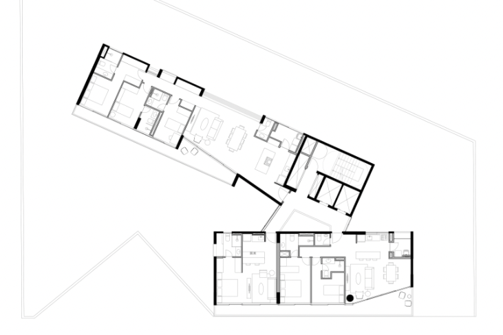 A floor plan of three units across the two-volume structure
