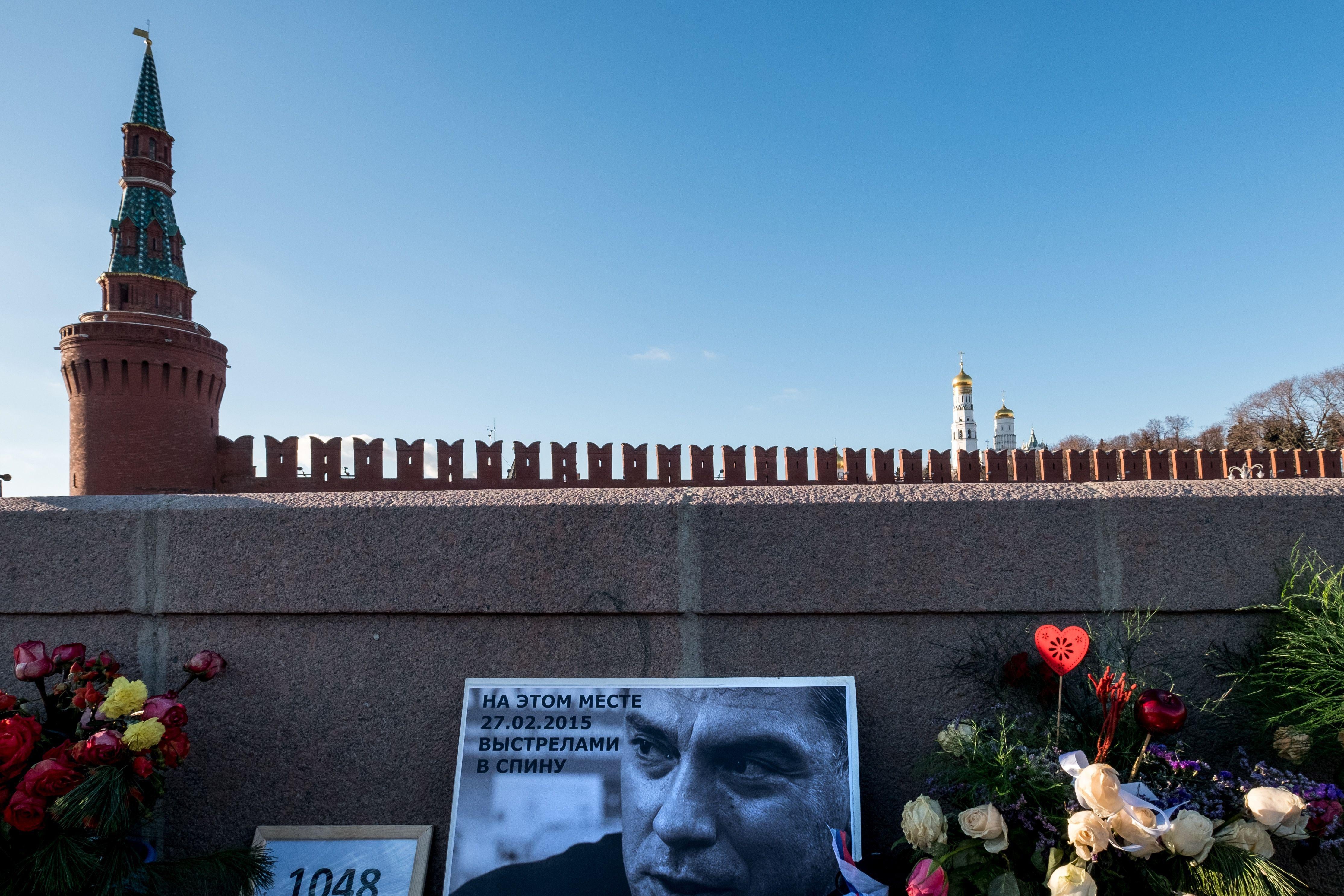 A view shows floral tributes and an image of Boris Nemtsov at the site where opposition leader was fatally shot on a bridge near the Kremlin, in Moscow on January 10, 2018.
The District of Columbia Council on January 9, 2018 approved the bill on renaming a stretch of Wisconsin Avenue outside the Russian Embassy in Washington to Boris Nemtsov Plaza. / AFP PHOTO / Yuri KADOBNOV        (Photo credit should read YURI KADOBNOV/AFP/Getty Images)