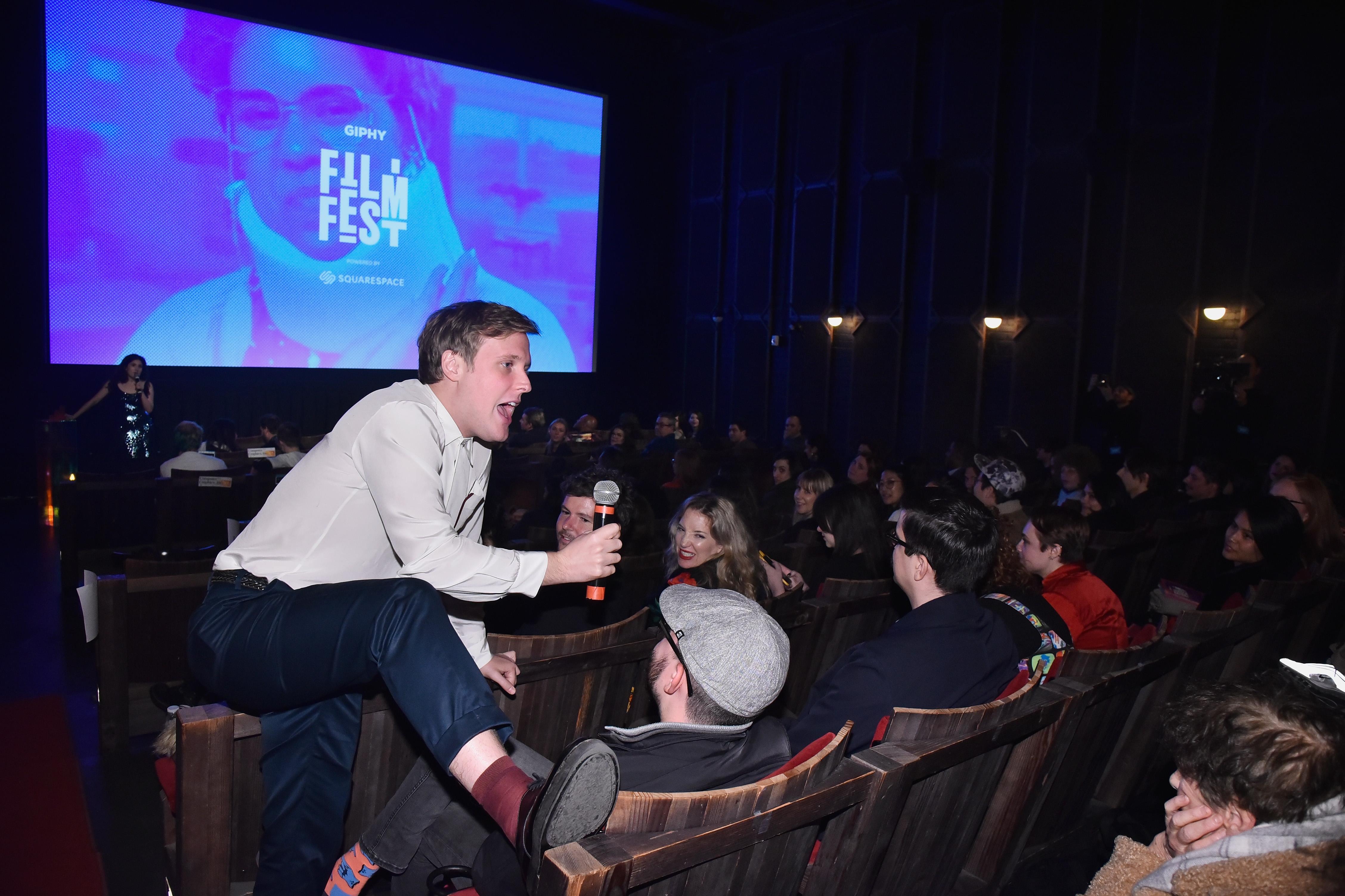 John Early doing crowd work in the audience at the Giphy Film Fest.