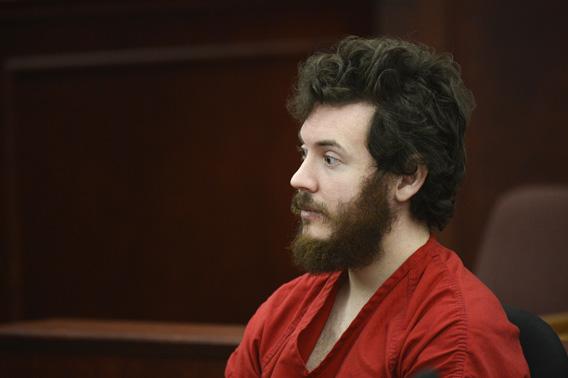 James Holmes, Aurora theater shooting suspect, sits in the courtroom during his arraignment in Centennial, Colo., on Tuesday, March 12, 2013.