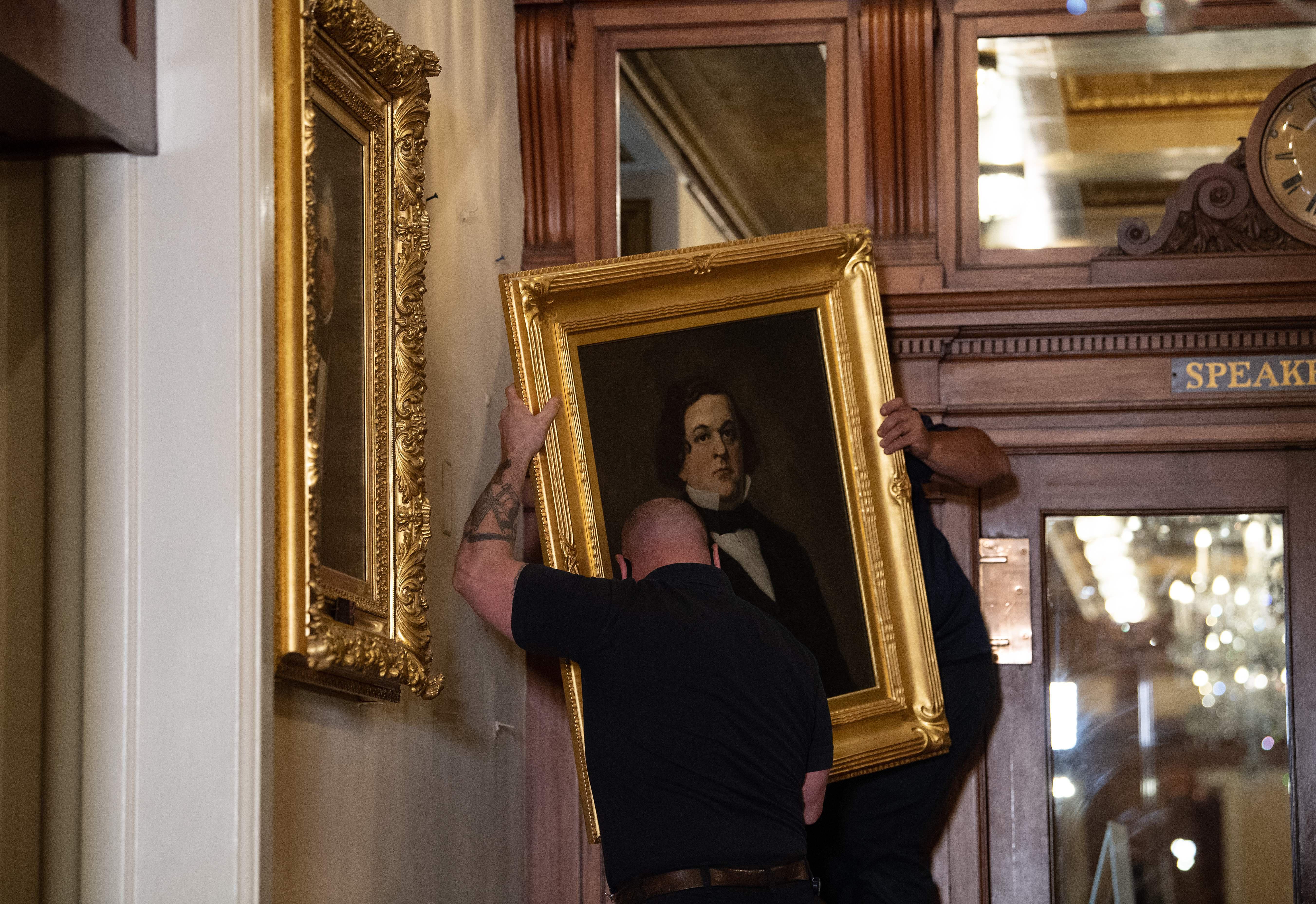 Pelosi orders Confederate portraits removed from Capitol.