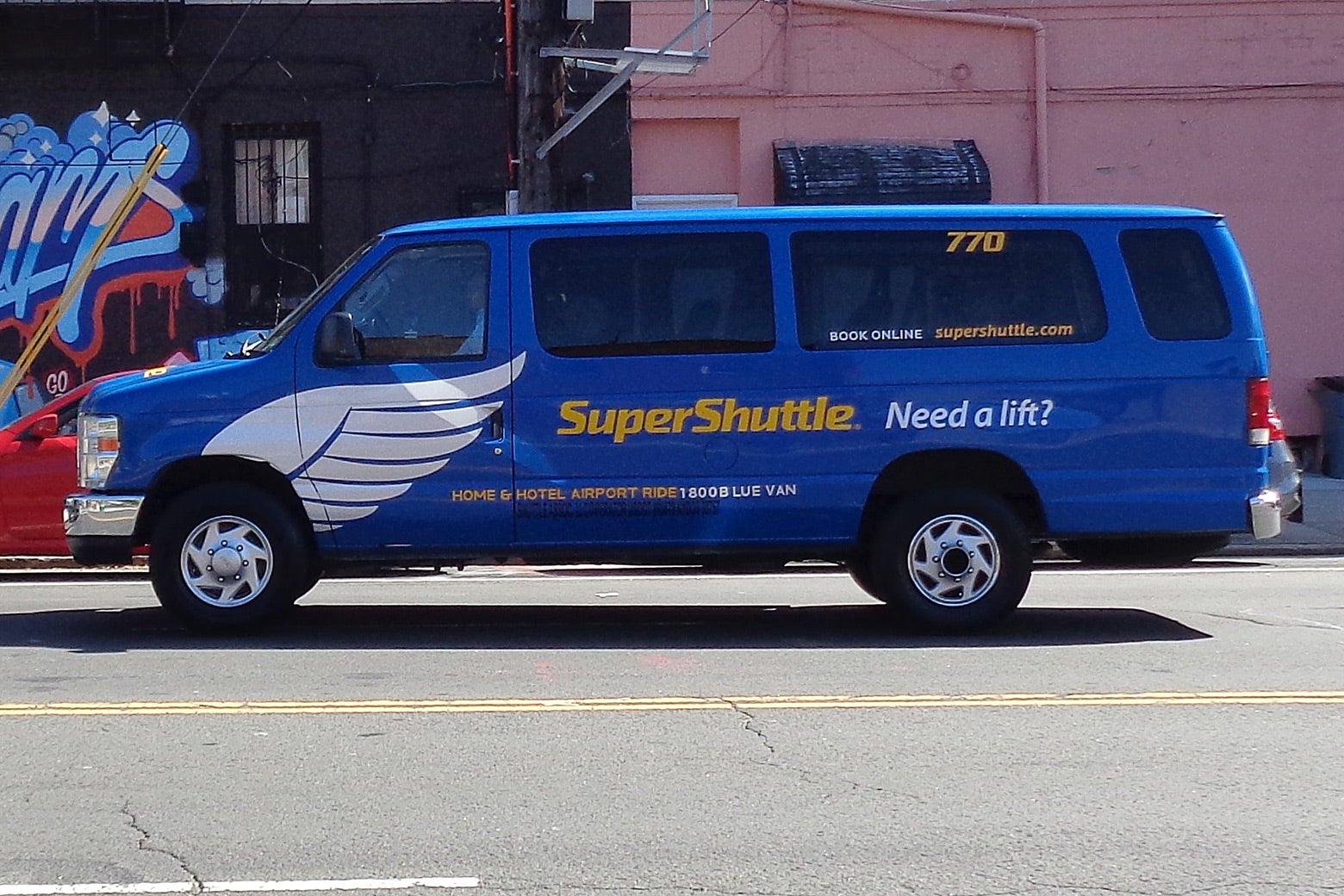 A SuperShuttle van.