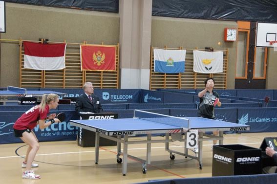 Luxembourg's table tennis star Ni Xianlian serves against teammate Sarah de Nutte.