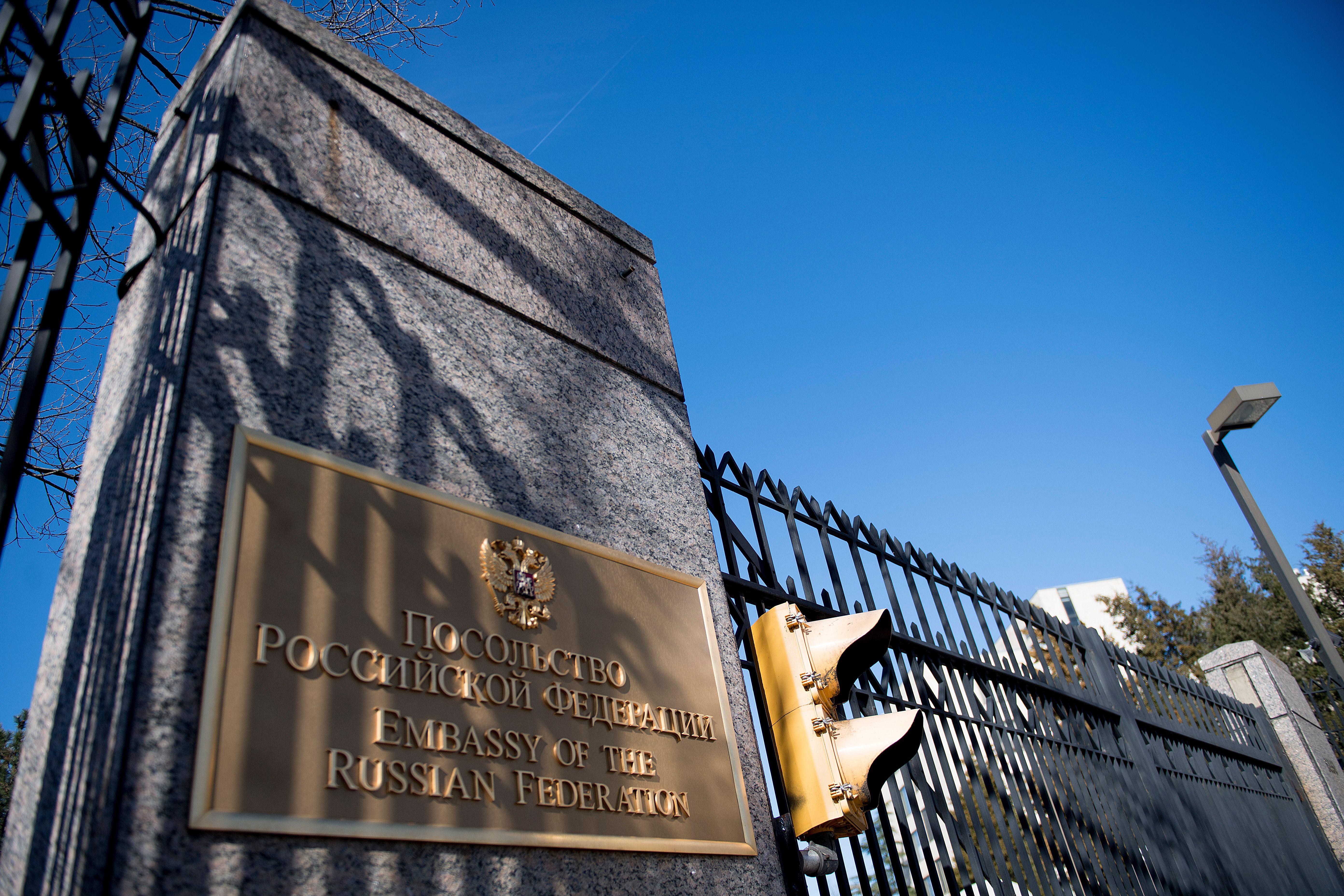 The sign for the Russian Embassy is viewed in Washington.