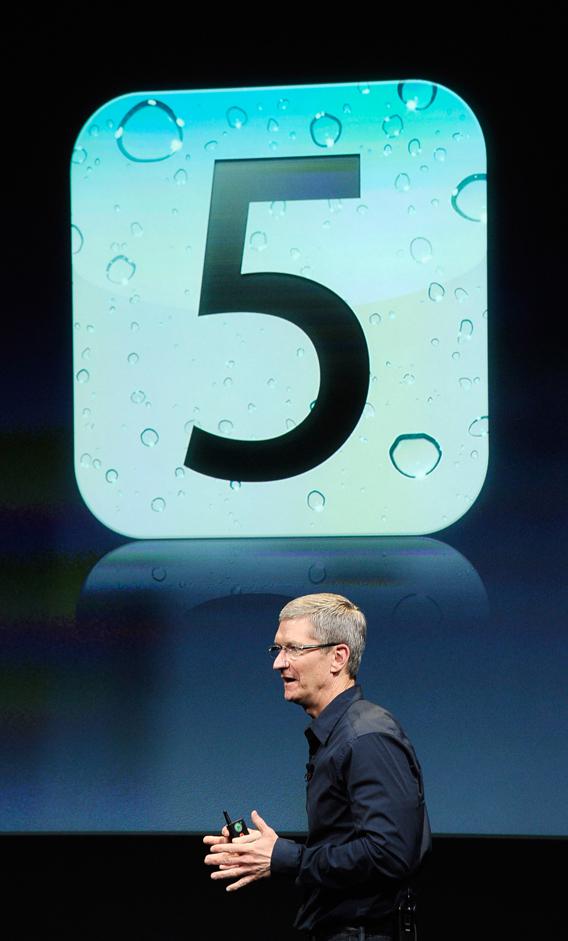 Apple CEO Tim Cook speaks at the event introducing the new iPhone 4s 
