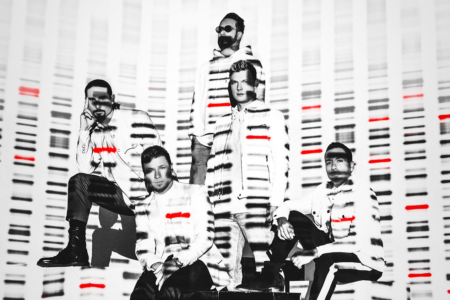The Backstreet Boys posed, lit with red and black bands of color resembling a DNA sequencing image.