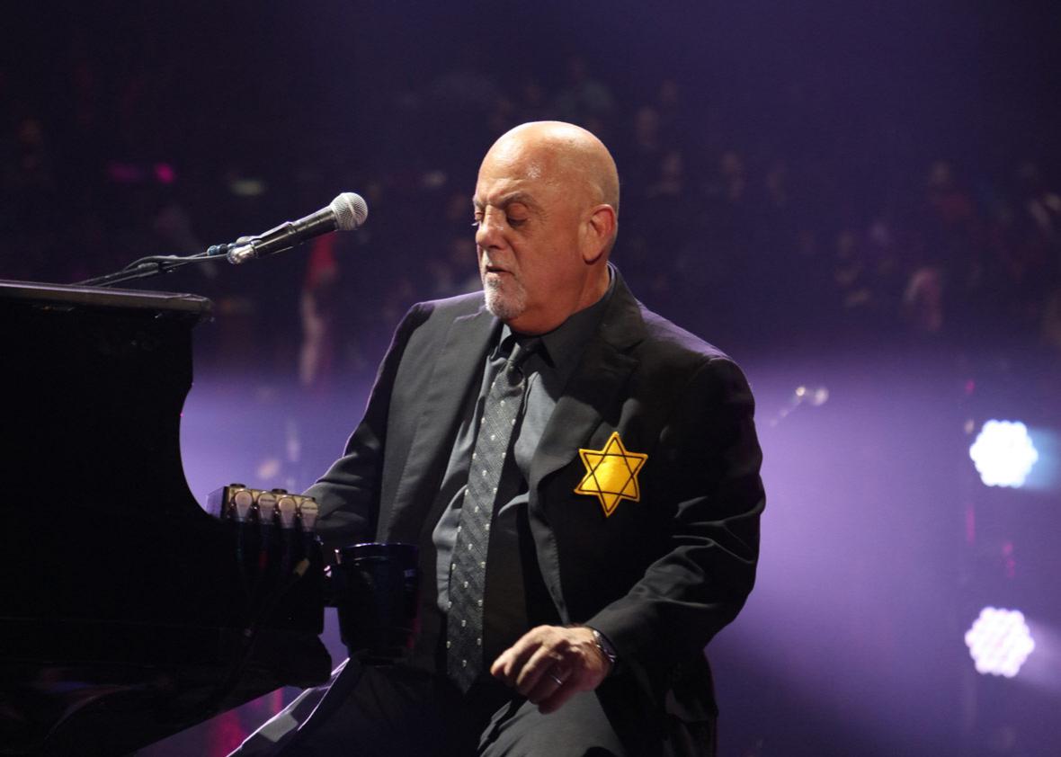 Billy Joel wears a jacket with the Star of David