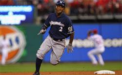 Milwaukee Brewers' Tony Plush (Nyger Morgan) puts on his skates with Sharks