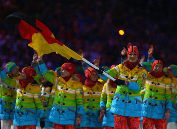 Skier Maria Hoefl-Riesch of the Germany Olympic team carries her country's flag during the Opening Ceremony of the Sochi 2014 Winter Olympics at Fisht Olympic Stadium on February 7, 2014 in Sochi, Russia.