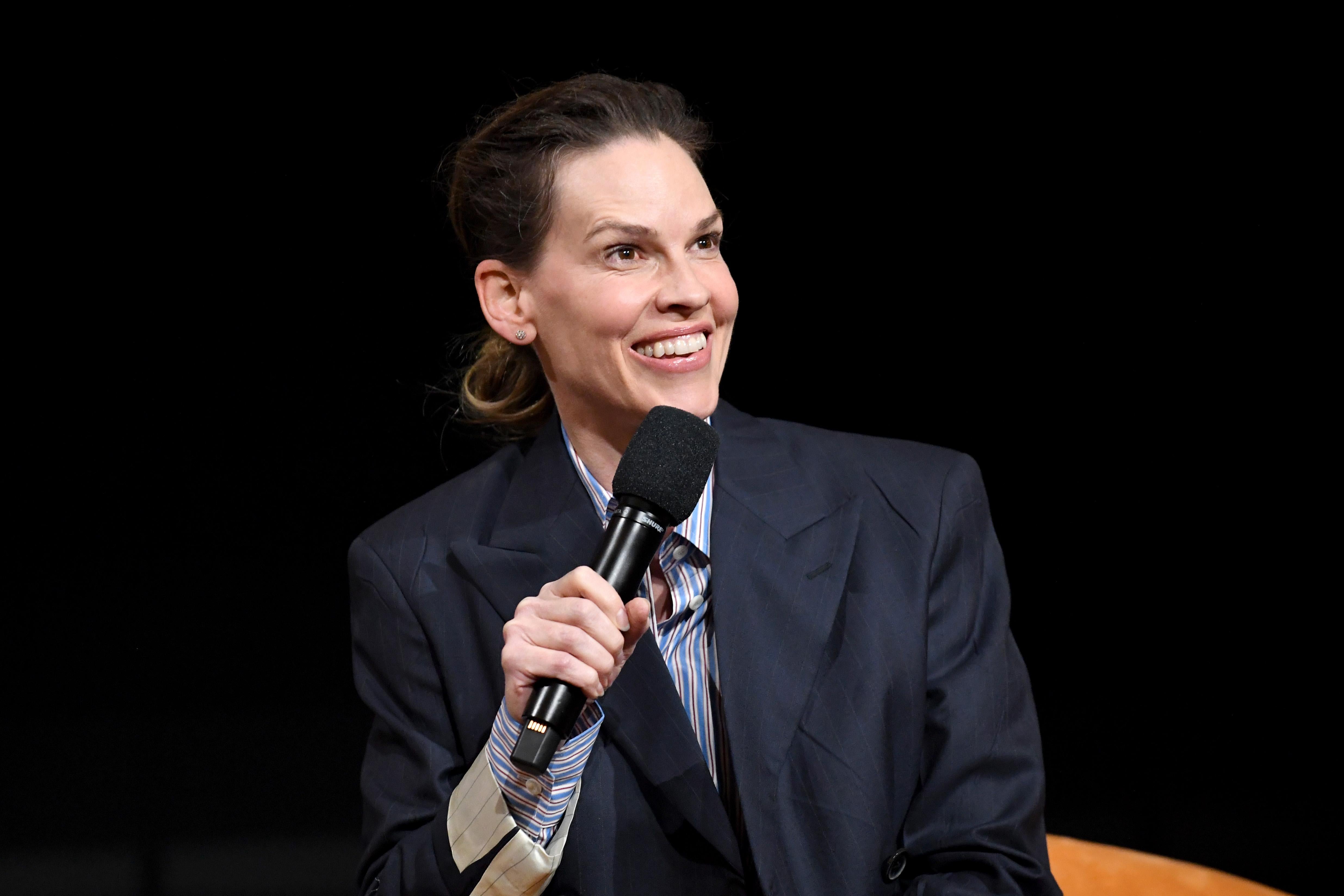 Hilary Swank speaks onstage