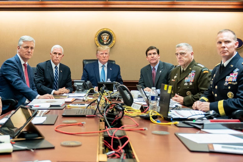 Left-to-right: National security adviser Robert O'Brien, Mike Pence, Donald Trump, Secretary of Defense Mark Esper, Chairman of the Joint Chiefs Army Gen. Mark A. Milley, and Brig. Gen. Marcus Evans looking grim-faced, seated around a long table with phones and wires in the center and a presidential seal on the wall behind them, in the Situation Room. 
