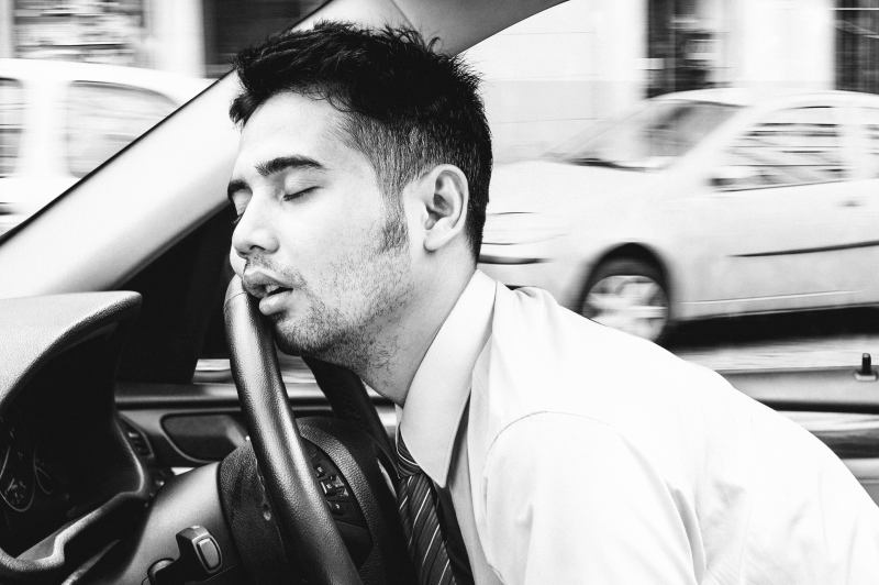 Tired driver being bombarded with surge icon.
