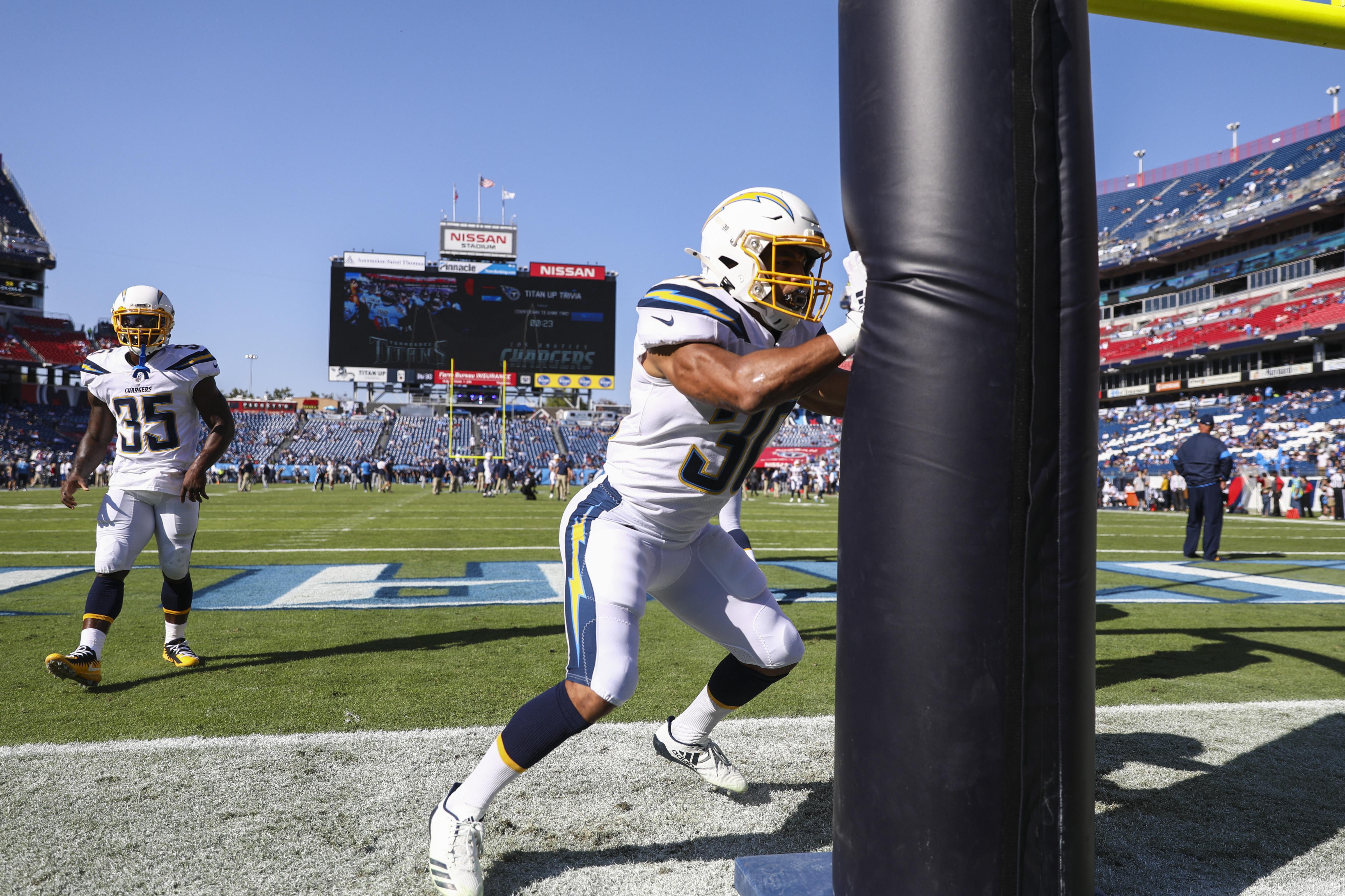 NASHVILLE, TENNESSEE - OCTOBER 20: Austin Ekeler #30 of the Los Angeles Chargers warms up on the field before the game against the Tennessee Titans at Nissan Stadium on October 20, 2019 in Nashville, Tennessee. (Photo by Silas Walker/Getty Images)