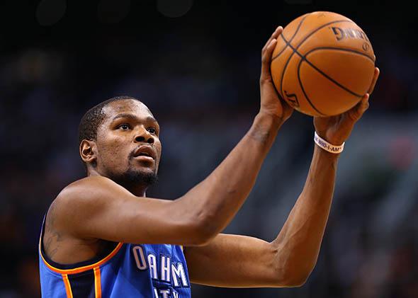 Kevin Durant #35 of the Oklahoma City Thunder shoots a free throw shot during the second half of the NBA game against the Phoenix Suns at US Airways Center on April 6, 2014 in Phoenix, Arizona.