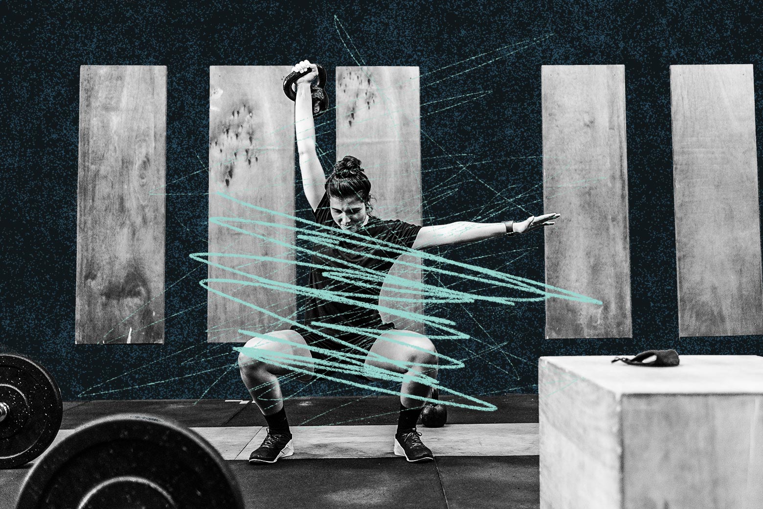 A woman in a squat lifting a kettlebell over her head with scribbles over the image.