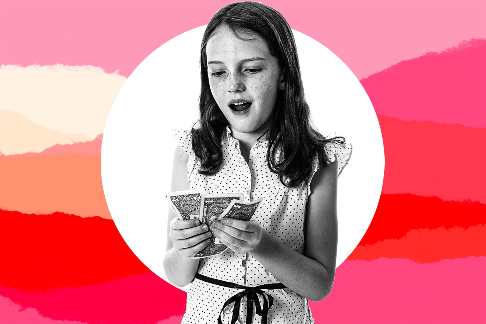 A young girl counts money.