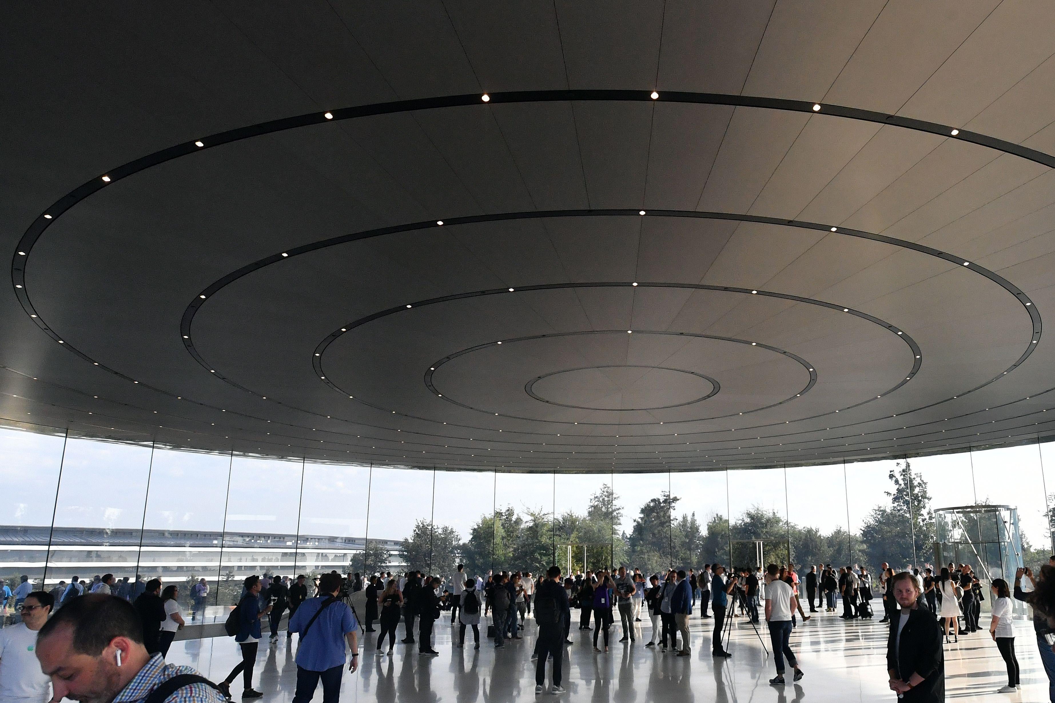 People gather at Apple's new headquarters in Cupertino, California.