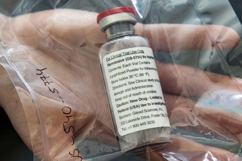 A vial of a drug in a plastic bag sitting on a person's hand