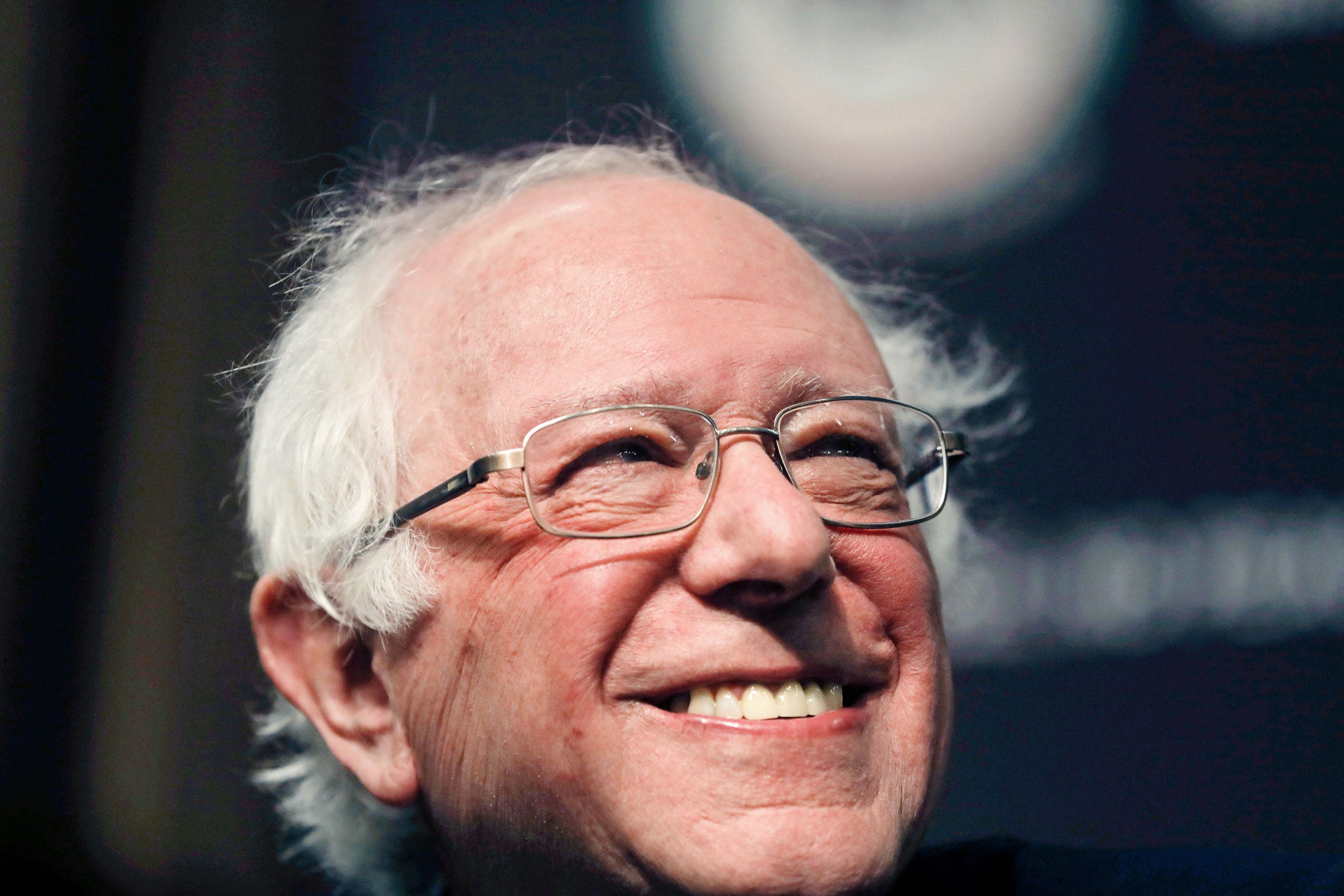 Bernie Sanders smiling.