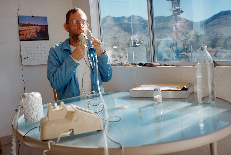 Thilde Jensen Canaries Man using his ultra-low-radiation phone. Dolan Springs, Ariz., 2005.