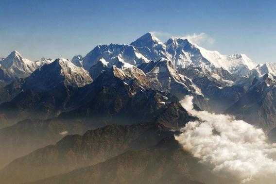 Mount Everest (C), the world highest peak, and other peaks of the Himalayan range.