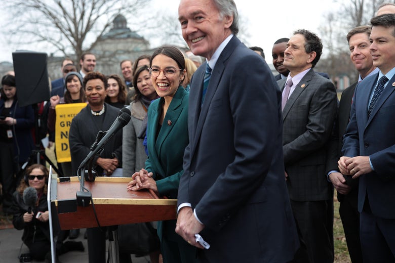 WASHINGTON, DC - FEBRUARY 07:  U.S. Rep. Alexandria Ocasio-Cortez (D-NY), Sen. Ed Markey (D-MA) and other Congressional Democrats listen during a news conference in front of the U.S. Capitol February 7, 2019 in Washington, DC. Sen. Markey and Rep. Ocasio-Cortez held a news conference to unveil their Green New Deal resolution. (Photo by Alex Wong/Getty Images)