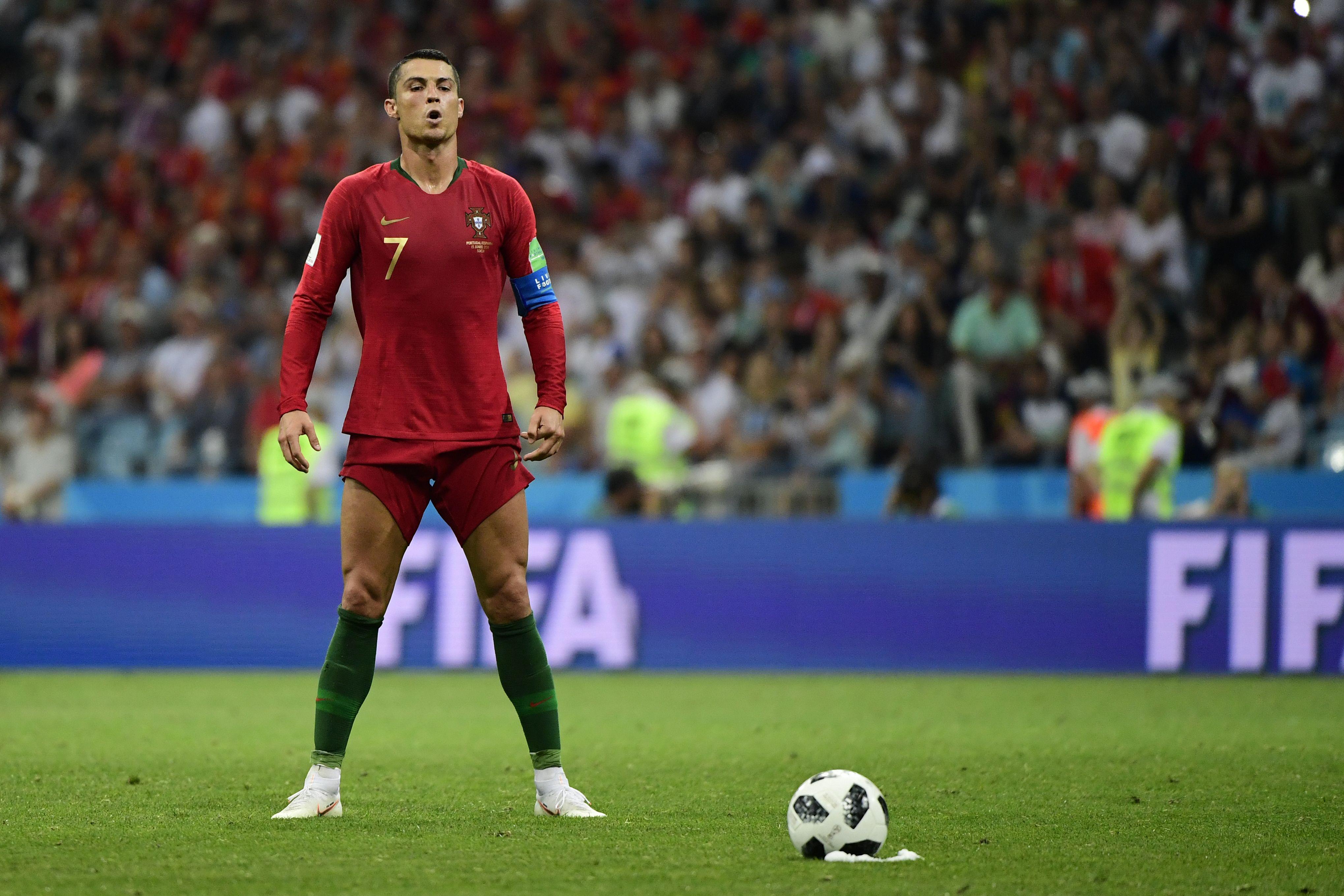 Portugal's forward Cristiano Ronaldo prepares to take a free kick.