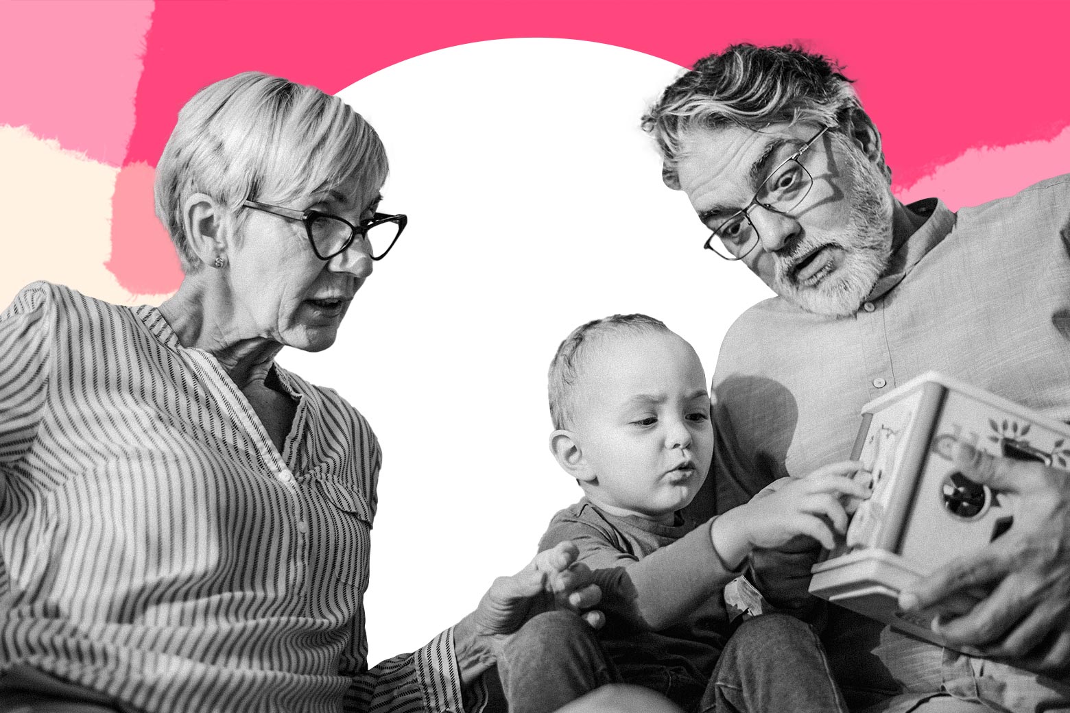 Grandparents playing with a baby.