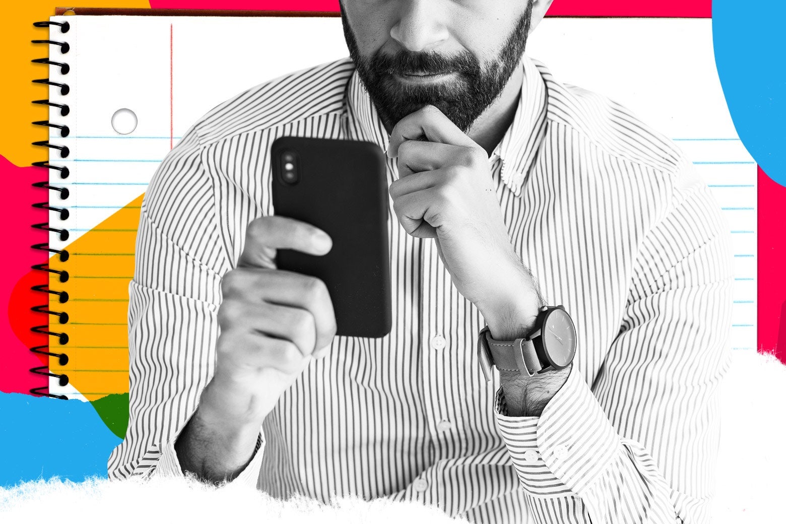 Bearded man in a collared shirt looking thoughtfully at his phone