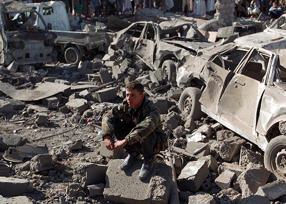 debris at the site of a Saudi air strike against Huthi rebels.