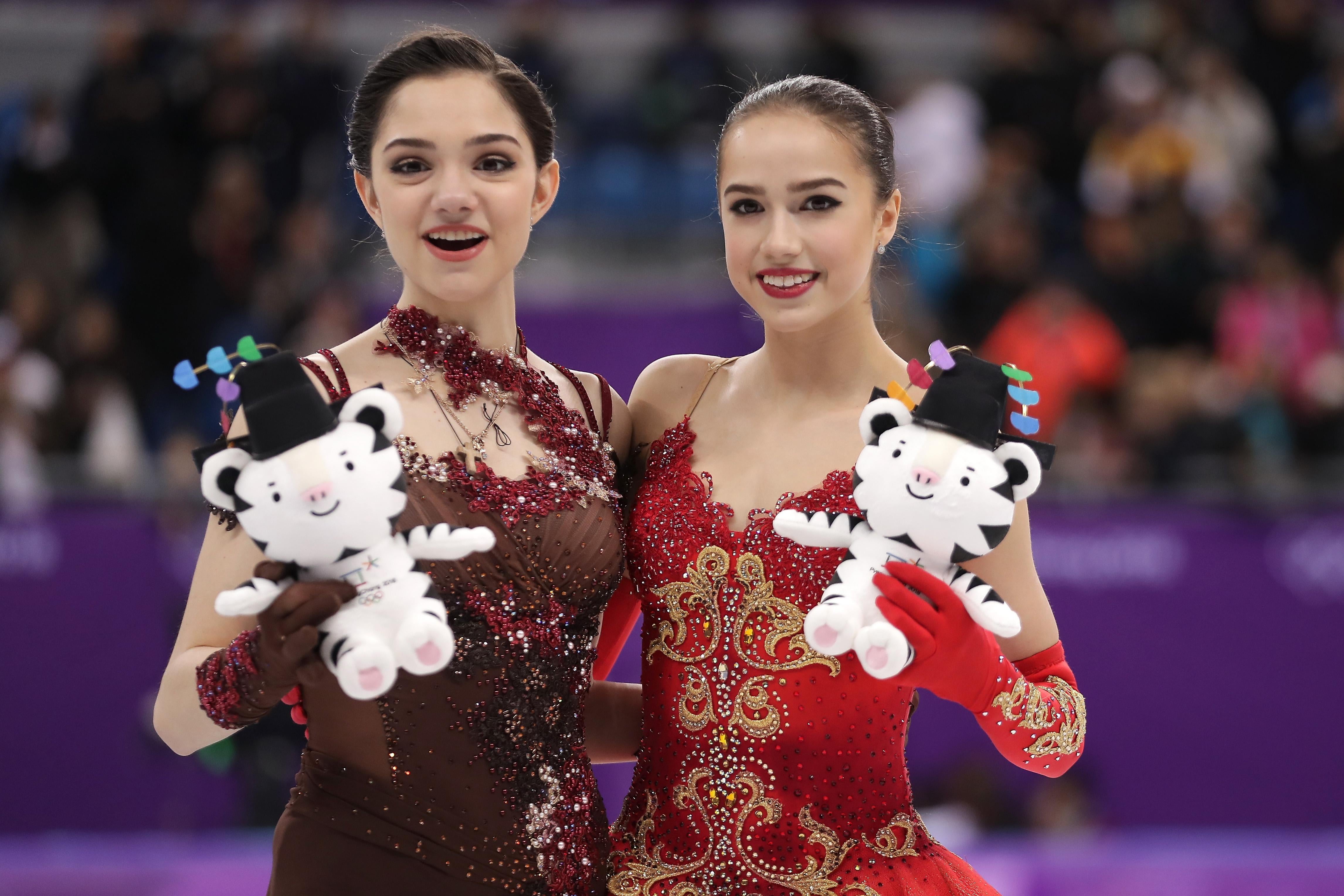 GANGNEUNG, SOUTH KOREA - FEBRUARY 23:  Silver medal winner Evgenia Medvedeva of Olympic Athlete from Russia (L) and gold medal winner Alina Zagitova of Olympic Athlete from Russia celebrate during the victory ceremony for the Ladies Single Skating Free Skating on day fourteen of the PyeongChang 2018 Winter Olympic Games at Gangneung Ice Arena on February 23, 2018 in Gangneung, South Korea.  (Photo by Richard Heathcote/Getty Images)