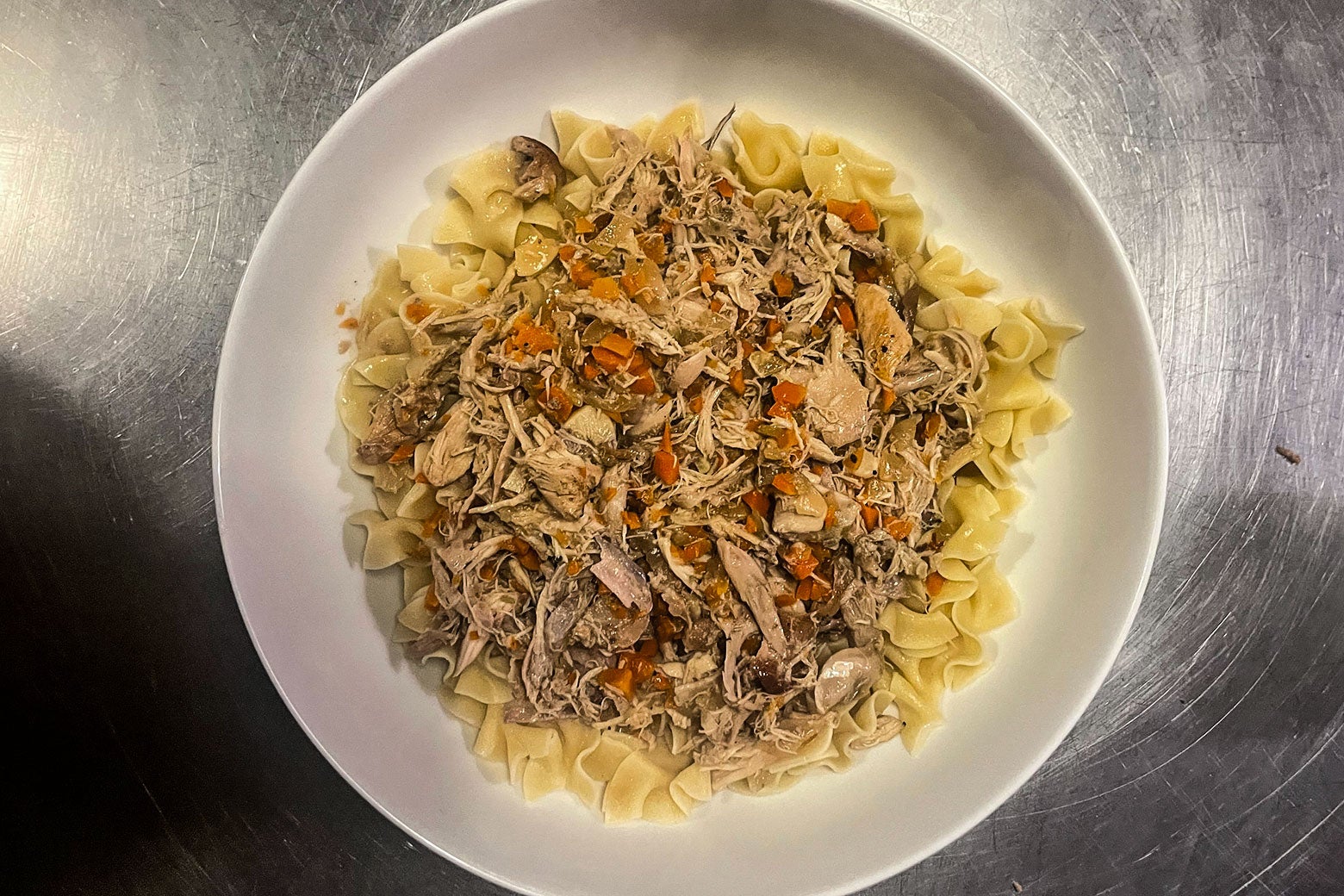 Rabbit ragu over egg noodles.